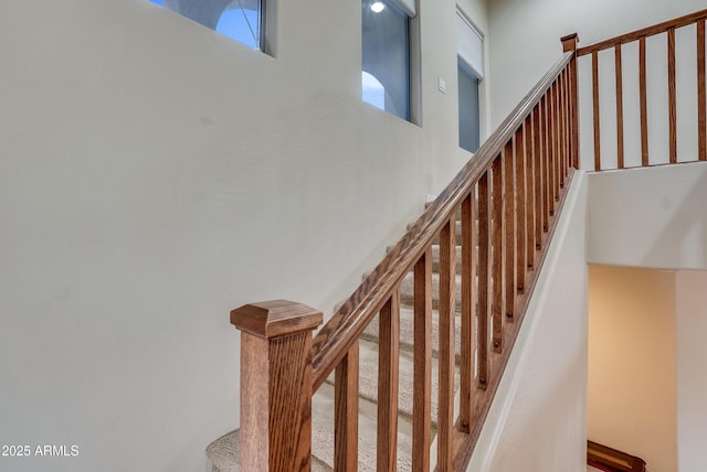 stairs with a towering ceiling