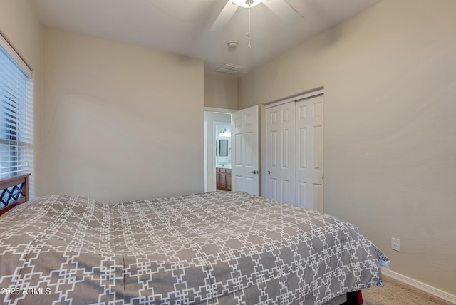 bedroom with ceiling fan, carpet flooring, and a closet