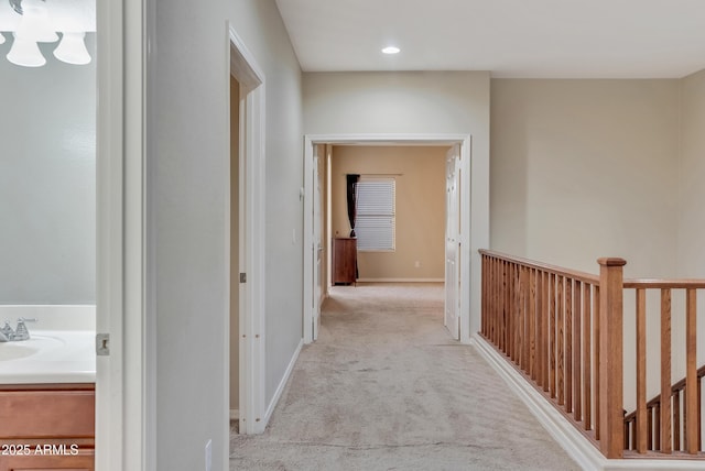 hallway with light carpet