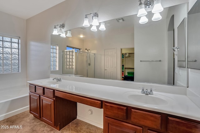 bathroom with vanity, tile patterned floors, and independent shower and bath