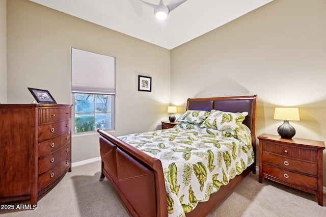 bedroom with light colored carpet and ceiling fan