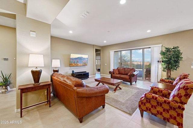 living room with light tile patterned floors