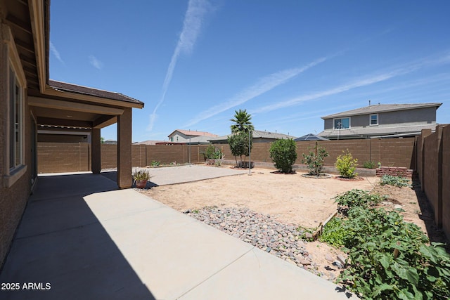 7648 W Kerby Ave, Phoenix, AZ 85043 - fenced backyard with a patio area