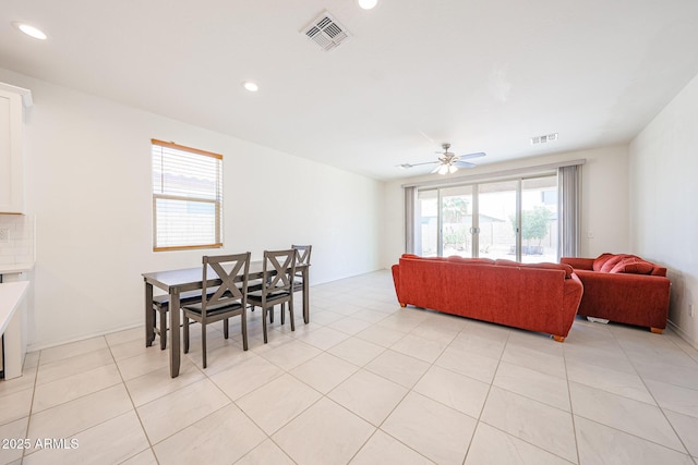 7648 W Kerby Ave, Phoenix, AZ 85043 - dining area with a ceiling fan, light tile patterned floors, and recessed lighting