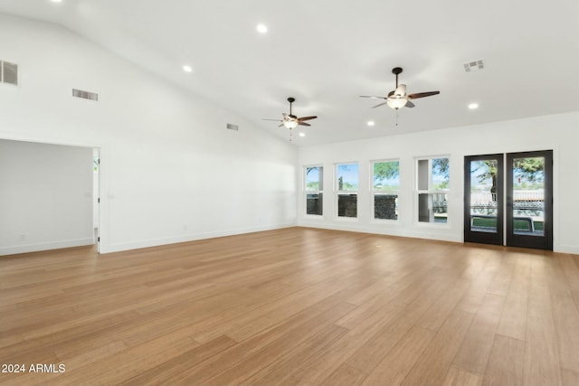 unfurnished living room featuring ceiling fan, high vaulted ceiling, and light hardwood / wood-style flooring