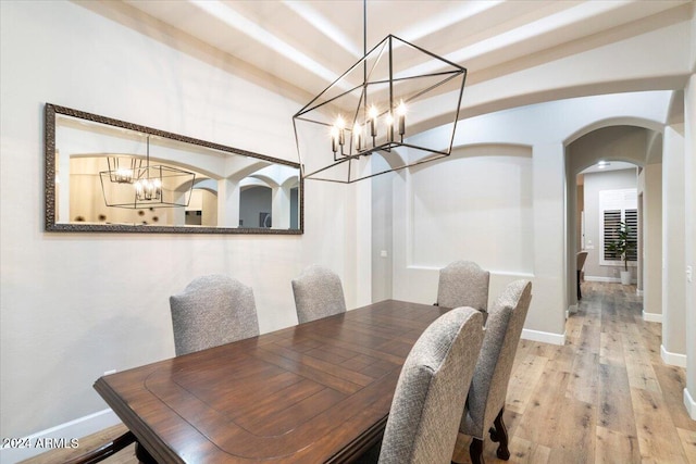 dining area with light hardwood / wood-style flooring