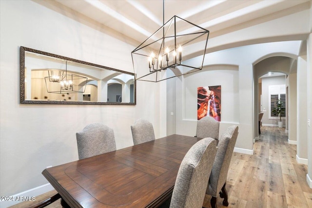 dining space with light wood-type flooring