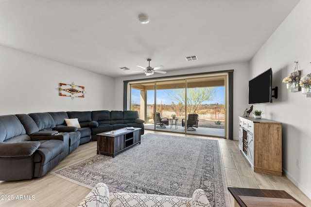 living room with ceiling fan