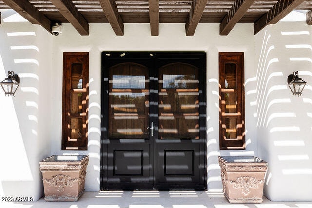 entrance to property with french doors