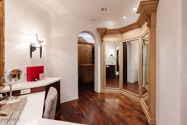 interior space featuring vanity and hardwood / wood-style flooring