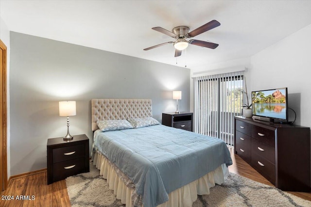 bedroom featuring ceiling fan and hardwood / wood-style floors