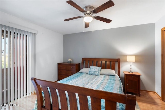 bedroom featuring light wood-type flooring and ceiling fan