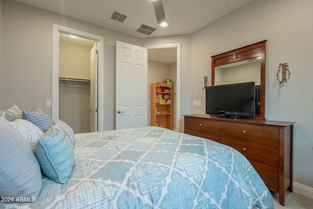 carpeted bedroom featuring a closet