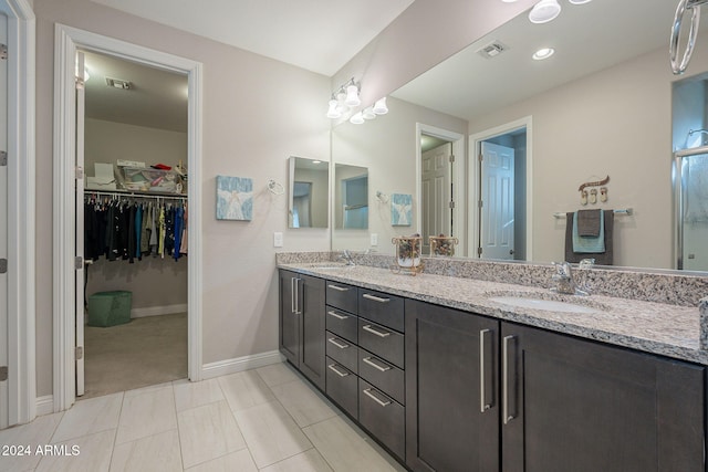 bathroom with vanity and tile patterned floors