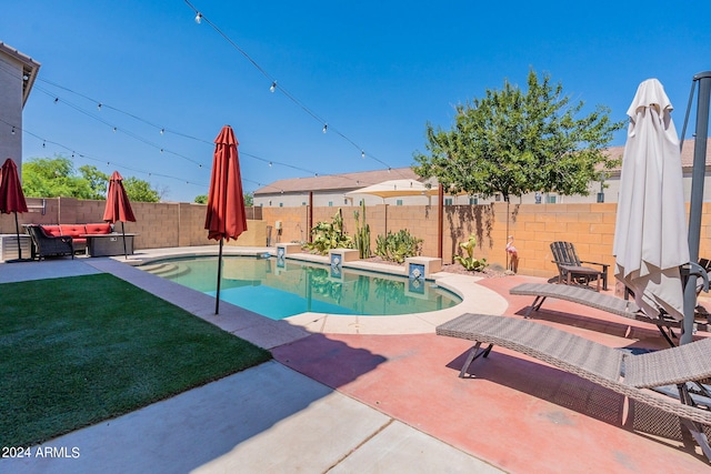 view of pool featuring a patio area