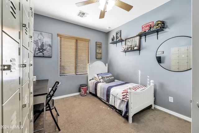 carpeted bedroom featuring ceiling fan