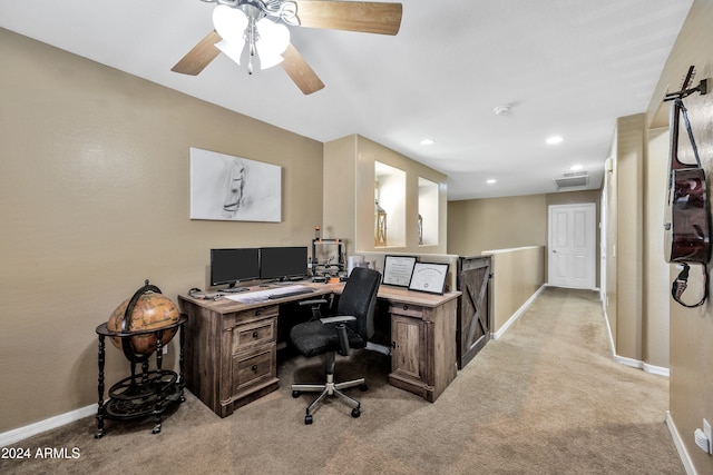 carpeted office with ceiling fan