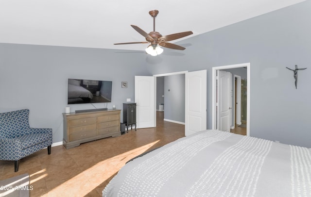 bedroom with ceiling fan and high vaulted ceiling