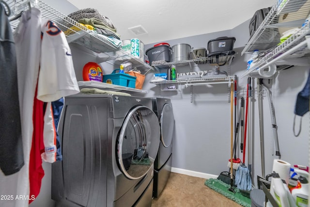 washroom with separate washer and dryer