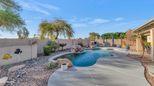 view of pool featuring pool water feature and a patio