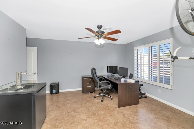 office area with ceiling fan and light tile patterned floors