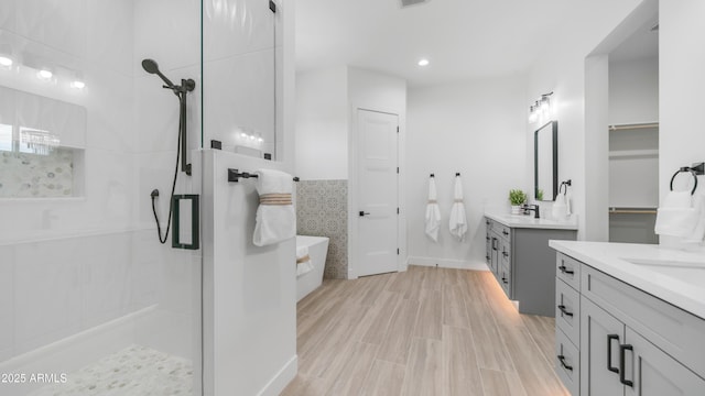 25916 S 198th St, Queen Creek, AZ 85142 - bathroom with walk in shower, visible vents, recessed lighting, a washtub, and two vanities