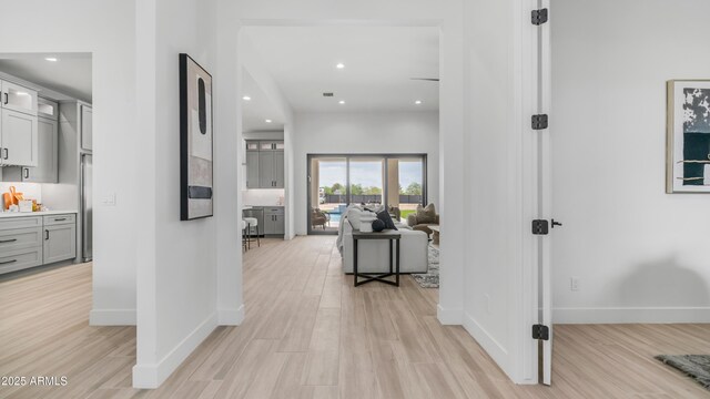25916 S 198th St, Queen Creek, AZ 85142 - corridor with baseboards, light wood finished floors, and recessed lighting