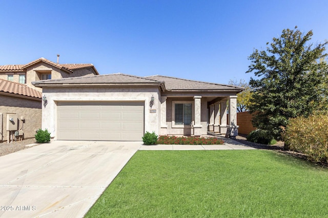 26058 W Yukon Dr, Buckeye, AZ 85396 - view of front of house with an attached garage, concrete driveway, a front yard, and stucco siding
