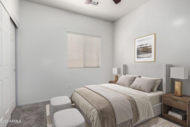 26058 W Yukon Dr, Buckeye, AZ 85396 - carpeted bedroom featuring a closet, baseboards, and a ceiling fan