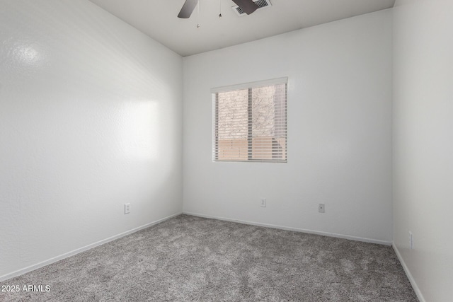 26058 W Yukon Dr, Buckeye, AZ 85396 - carpeted spare room featuring ceiling fan and baseboards