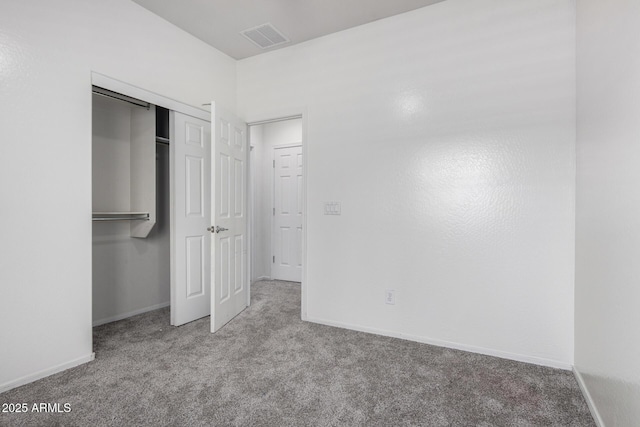 26058 W Yukon Dr, Buckeye, AZ 85396 - unfurnished bedroom featuring carpet floors, baseboards, and a closet