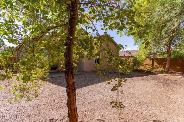 26058 W Yukon Dr, Buckeye, AZ 85396 - view of yard featuring fence and a patio