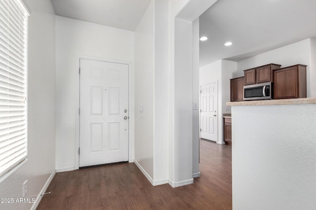 26058 W Yukon Dr, Buckeye, AZ 85396 - corridor with dark wood-style flooring, baseboards, and recessed lighting