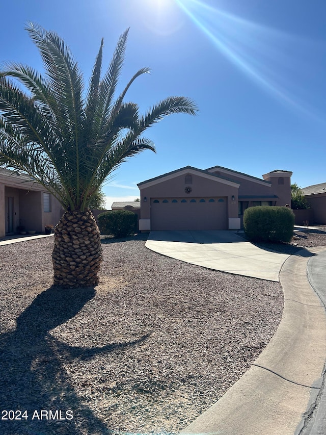 view of property exterior with a garage