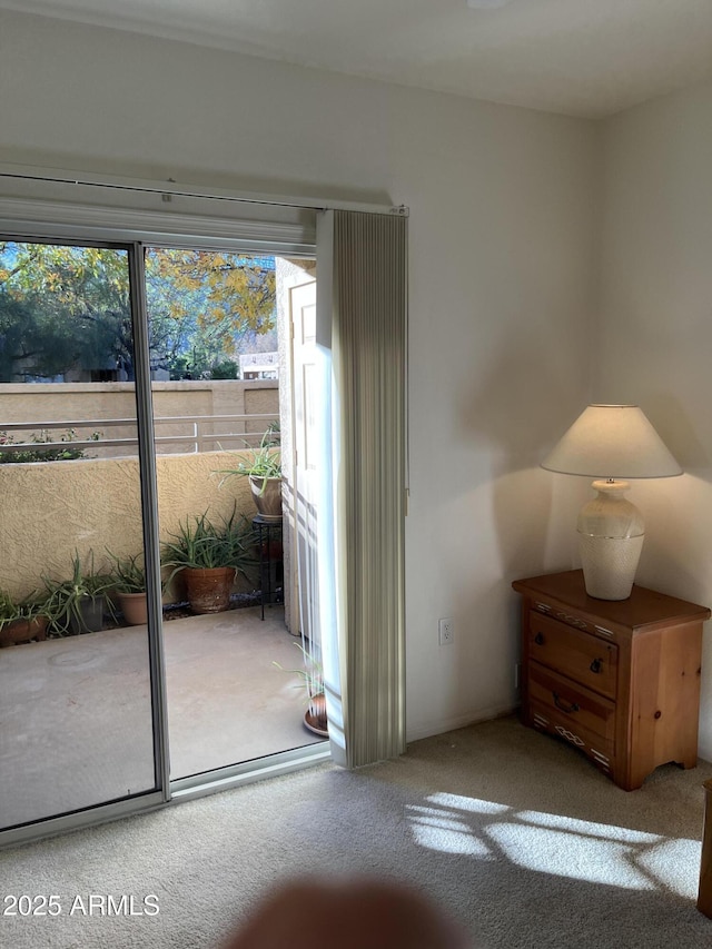 entryway featuring carpet flooring