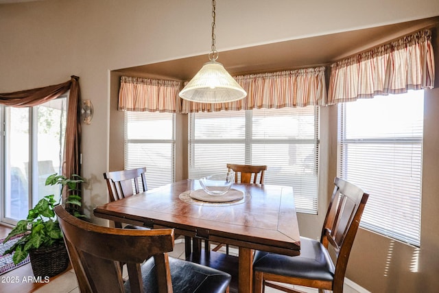 view of tiled dining space