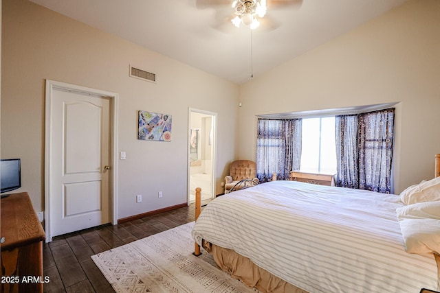 bedroom featuring ceiling fan, connected bathroom, and lofted ceiling