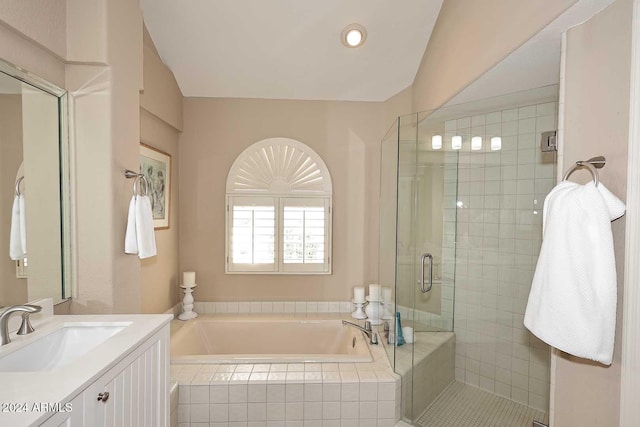 bathroom with vanity and plus walk in shower