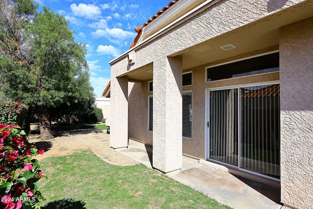 exterior space with a yard