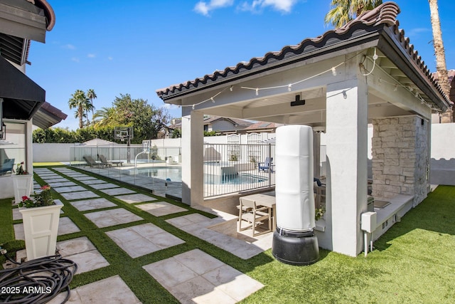 exterior space featuring a fenced in pool and fence private yard