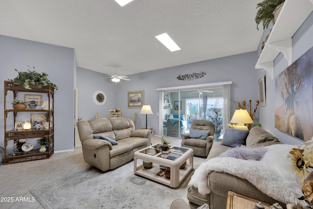 tiled living room featuring a textured ceiling