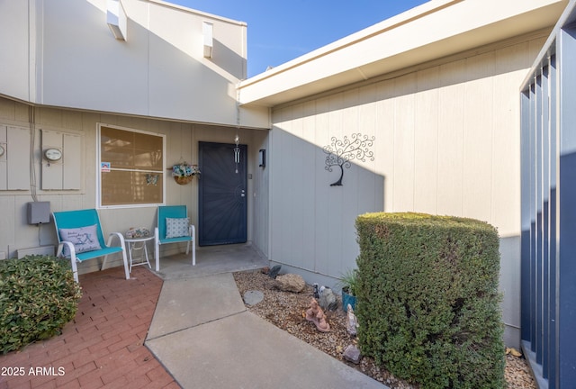 property entrance featuring a patio