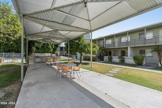 1702 W Tuckey Ln Unit 116, Phoenix, AZ 85015 - surrounding community with outdoor dining space and a patio area