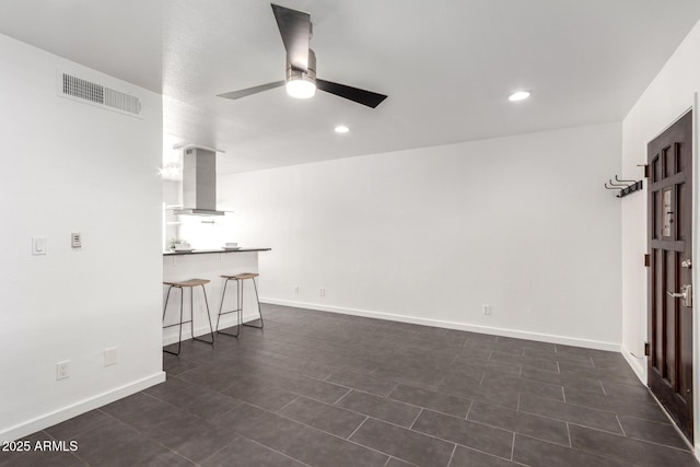 unfurnished living room featuring recessed lighting, baseboards, visible vents, and ceiling fan