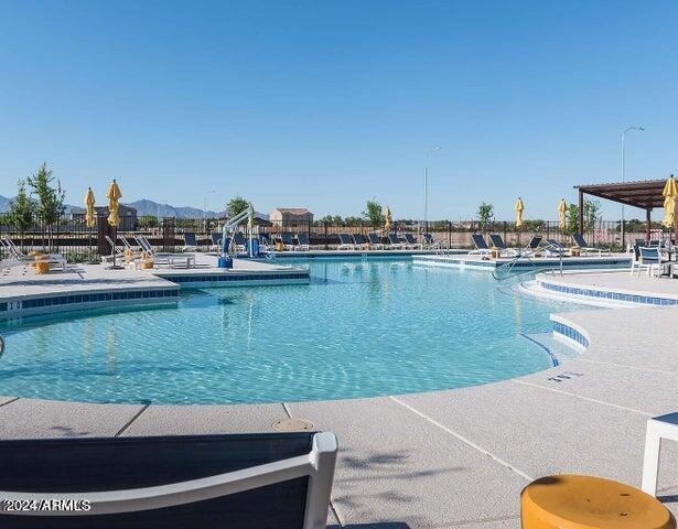 view of swimming pool with a patio area