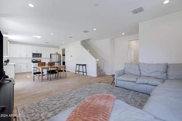 living room featuring light wood-type flooring