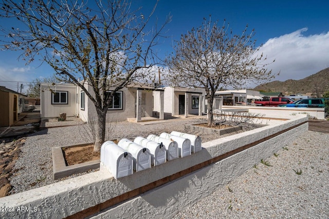 view of front facade featuring a mountain view