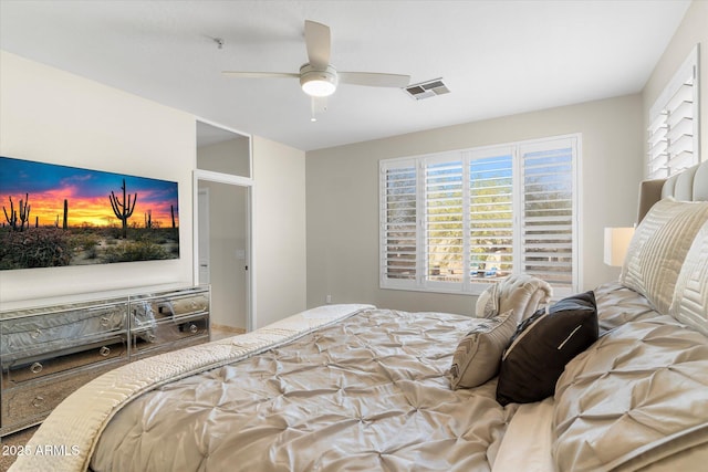 bedroom with visible vents and ceiling fan