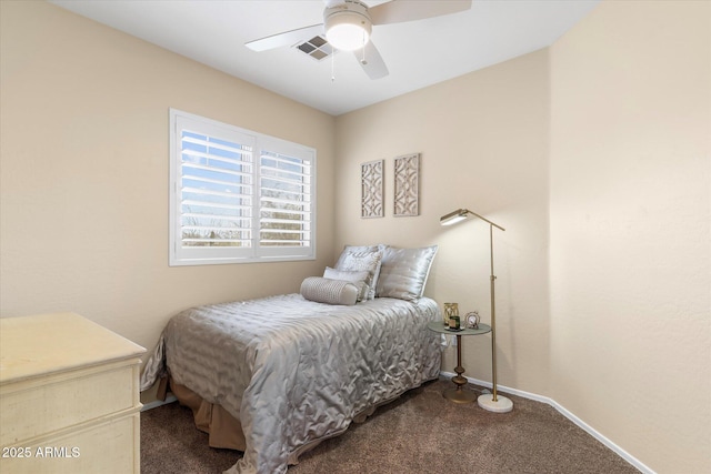 bedroom with visible vents, baseboards, a ceiling fan, and dark carpet