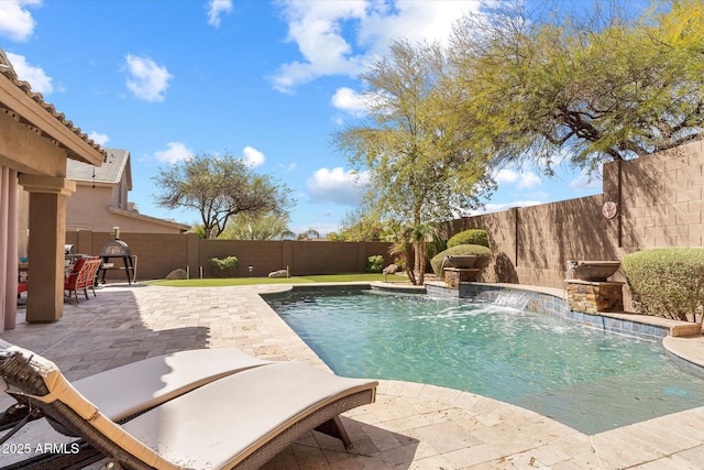 view of pool featuring a fenced backyard, a fenced in pool, and a patio